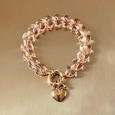 Bracelet de perles champagne en résine, chaine et pendentif plaqué or 24 carats . Crée, monté et doré à Paris. Livraison gratuite en France et en Europe. Tout nos bijoux sont sans nickel et or "conflict free". 26 Juin Bijoux